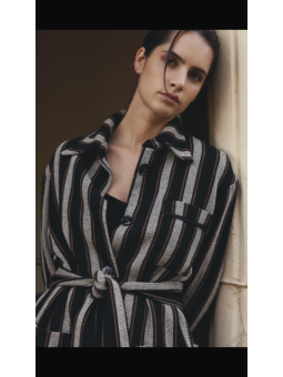 VESTE COMO